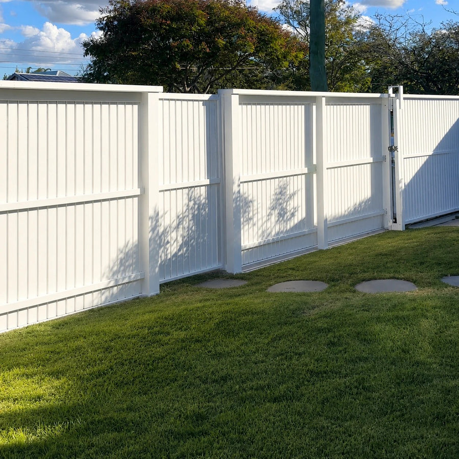 Before: a white fence before and after an advanced hedge row was planted